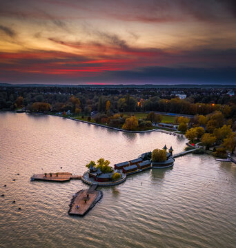 Keszthely, Hungary - Aerial panoramic view of the beautiful Pier of Keszthely by the Lake Balaton with a colorful autumn sunset. Famous touristic attraction in Zala county
