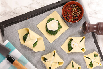 cooking pastry with spinach and goat cheese