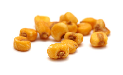 Large yellow salted corn nuts isolated on white background