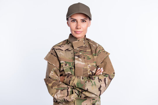 Photo of young woman confident soldier army officer crossed hands uniform isolated over white color background