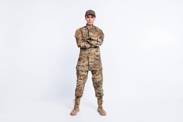 Full length photo of young woman confident crossed hands soldier officer army camouflage uniform...
