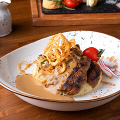 Fried pork cutlet with mushed potato