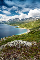 Naklejka na ściany i meble Hiking at Jotunheimen National Park, Norway Scandinavia, beautiful lake view