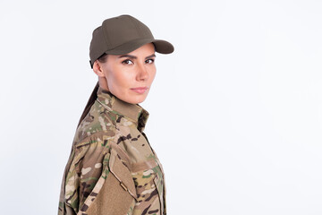 Profile portrait of charming young military girl look camera no emotions face isolated on white...