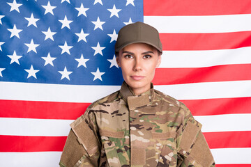 Photo of pretty young military person look concentrated camera composed face isolated on us national flag background
