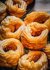 Closeup of yummy French cruller doughnuts