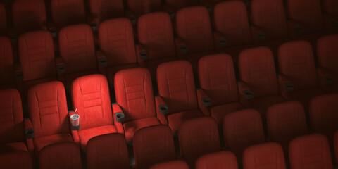 Cinema movie theater concept background. Red cinema seats and cola in empty theater.