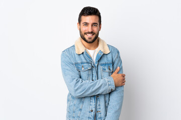 Young handsome man with beard isolated on white background laughing