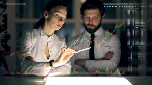 A group of scientists performs calculations using holographic projection. The Concept of Digitalization of Information, data visualization. Artificial neural network and Machine learning
