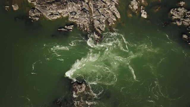 Aerial top view of the powerful flow of the mountain green river Katun. Chemal village, Altai Republic, Russia