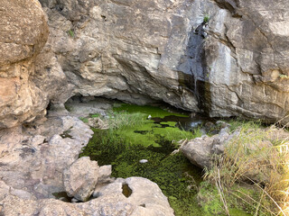Charco verde en medio de unas rocas, Gran Canaria