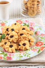 Kue Semprit, Indonesian Traditiona Cookies Served to Celebrate Lebaran  Idul Fitri Ied Mubarak. Made from Butter, Flour, Egg, with Flower Shape