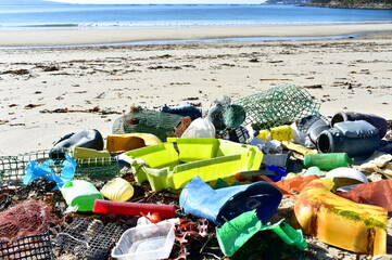 Beach with plastic pollution on sand at famous Rias Baixas Region. Galicia, Spain.