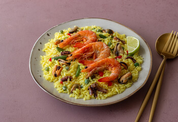 Spanish paella with seafood, shrimp and vegetables. Healthy eating. Spanish cuisine.