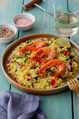 Spanish paella with seafood, shrimp and vegetables. Healthy eating. Spanish cuisine.