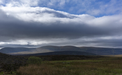 Fototapeta na wymiar Beautiful scenery along the way from road trip in Scotland