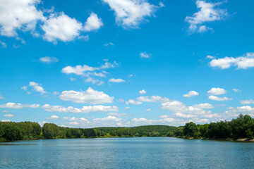 Obraz na płótnie Canvas landscape with river and blue sky