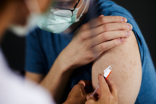 Woman getting covid vaccine