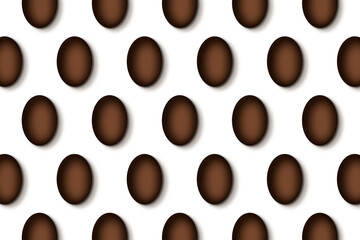 Chocolate Easter eggs pattern on white background.