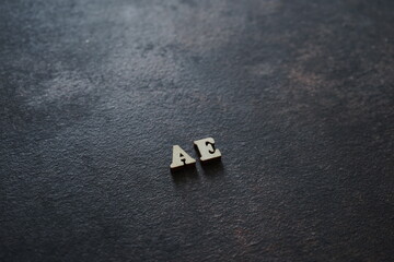 the initials of the letter AE