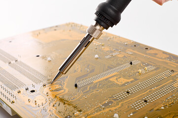 Soldering iron isolated on a white background. A tool for soldering wires, installing pipes,...
