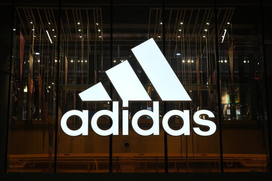 Shanghai.China-Feb.2021: big adidas sign on store window. A German sports brand