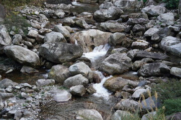 Wild river flow with rocks landscape in Taiwan.