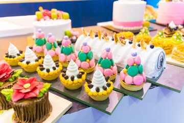 Catering sweets, closeup of various kinds of different types of Sweet Cakes in Bakery Shop