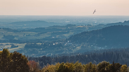 Beautiful autumn or indian summer view with a model airplane and the famous Bogenberg in the far...