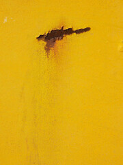 old yellow metal with rust texture