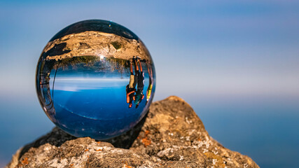 Crystal ball alpine summer landscape shot at the famous Hochfelln summit, Bergen, Bavaria, Germany