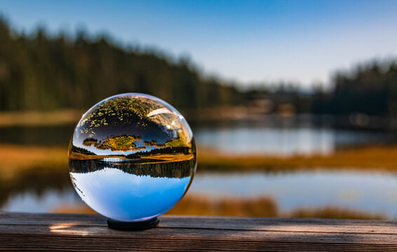 Crystal ball alpine summer landscape shot at the famous Grosser Arbersee, Bayerisch Eisenstein, Bavarian forest, Bavaria, Germany