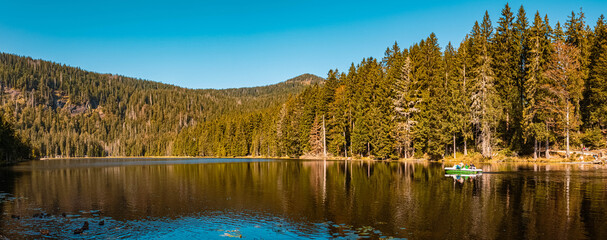 High resolution stitched panorama of a beautiful autumn or indian summer view at the famous Grosser Arbersee, Bayerisch Eisenstein, Bavarian forest, Bavaria, Germany