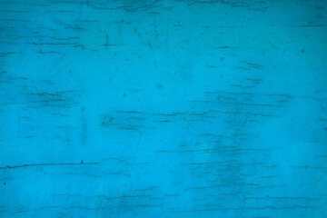 Old wood vintage background blue pastel colour with cracks and patina. 