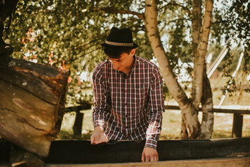 The man found gold. Contemporary lucky prospector found lot of gold in creek when panning sand.