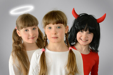 behind the shoulders of the kid child are an angel and a demon teach good and evil give advice...