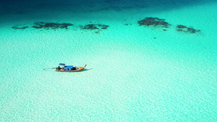 aerial view long tail boats and Beautiful crystal clear water at island Koh Lipe in Satun,Southern...