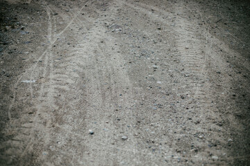 Tire tracks in a dirty road