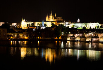 Fototapeta na wymiar Prague cityscape at night with Vltava River, Czech Republic