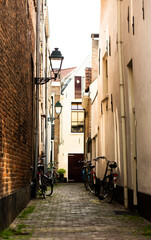 Bicycles in narrow street in town, Netherlands