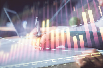 Double exposure of forex chart drawing over people taking notes background. Concept of financial analysis