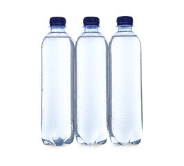 Plastic bottles with soda water on white background
