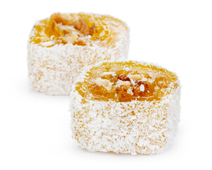Yellow Turkish Delight with nuts in powdered sugar isolated on white