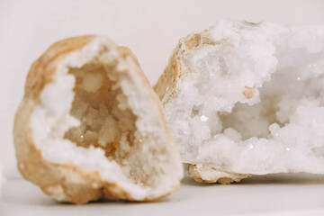 Section of agate stone with geode on white background. Copy, empty space for text. Origin: Morocco