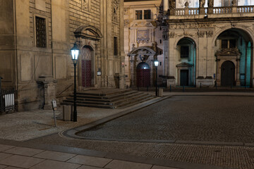 street lamp on the pavement in the old town of prague at night