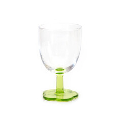 Empty glass goblet on green stem isolated on white background