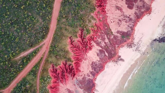 Green Field With Dirt Track At Headland Of James Price Point In Broome, Australia. - aerial