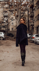 Beautiful woman posing outdoors. Fashion/Beauty concept.