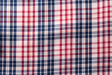 Checkered multi-colored fabric, close-up. Decoration