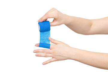 man winds an elastic bandage on his hand on a white background, isolate. The concept of fixation of...